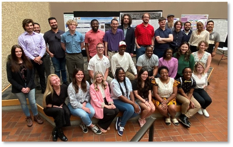 grad students at poster competition